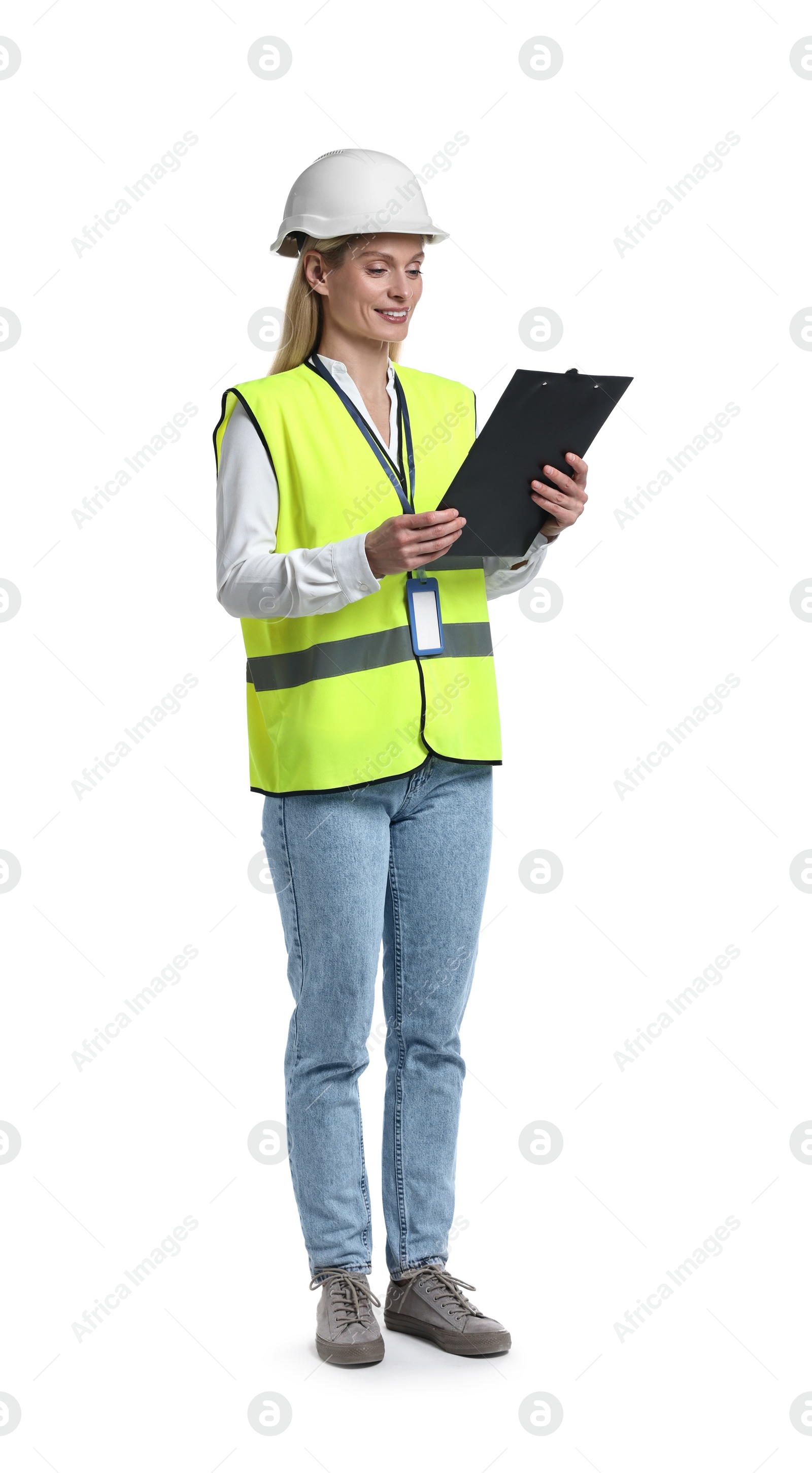 Photo of Engineer in hard hat holding clipboard on white background