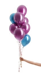 Woman holding bunch of balloons on white background, closeup