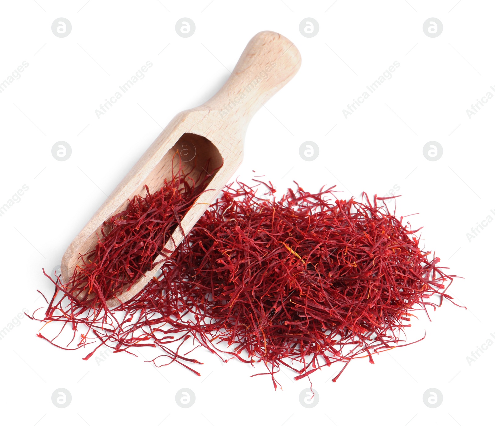 Photo of Pile of dried saffron and wooden scoop on white background, top view