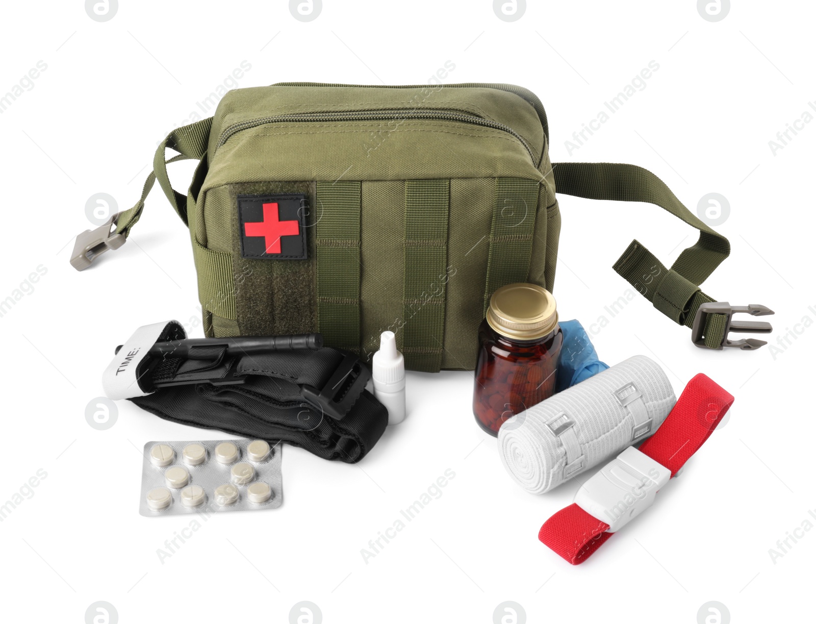 Photo of Military first aid kit, tourniquet, pills and tools on white background