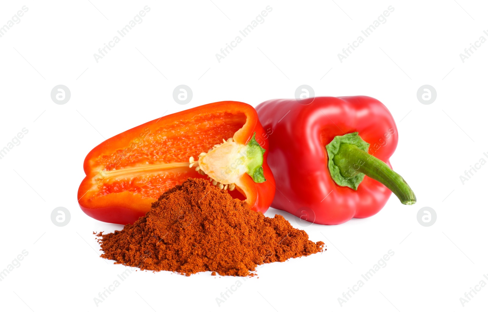 Photo of Fresh bell peppers and paprika powder on white background