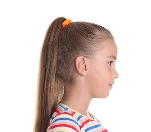 Cute little girl on white background. Hearing problem