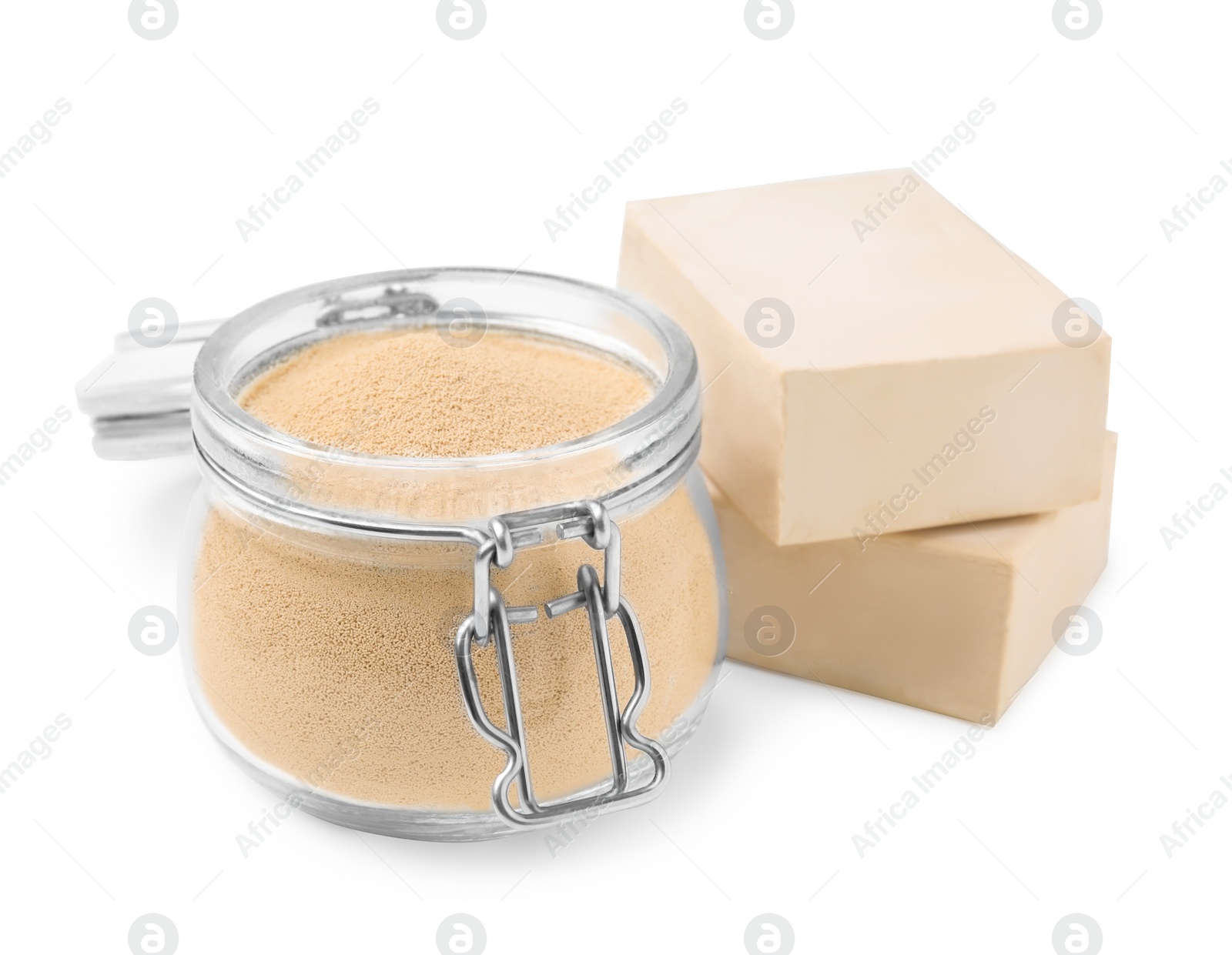 Photo of Compressed and granulated yeast on white background