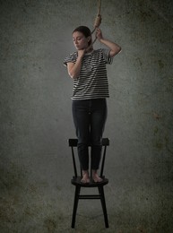 Image of Depressed woman with rope noose standing on chair against grey background. Suicide concept