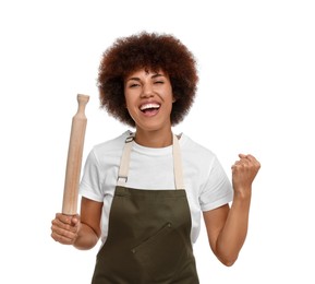 Emotional young woman in apron holding rolling pin on white background