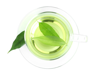 Photo of Cup of aromatic green tea with leaves isolated on white, top view