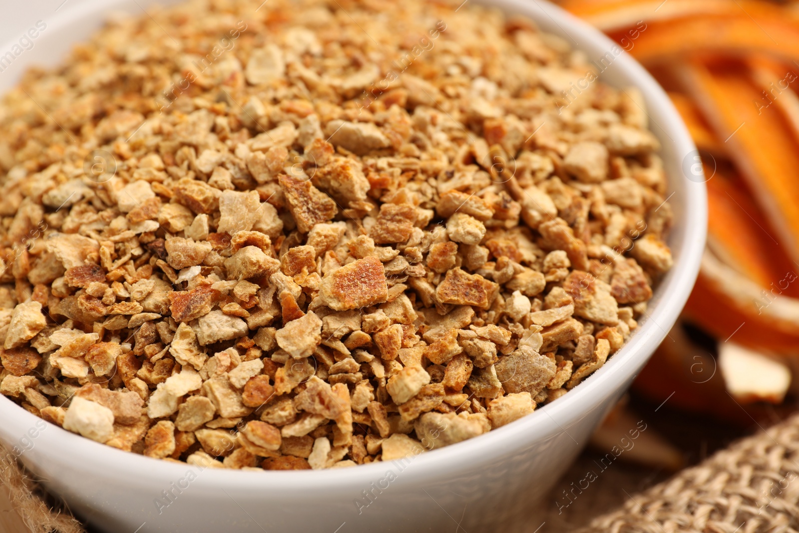 Photo of Dried orange seasoning zest and peel, closeup