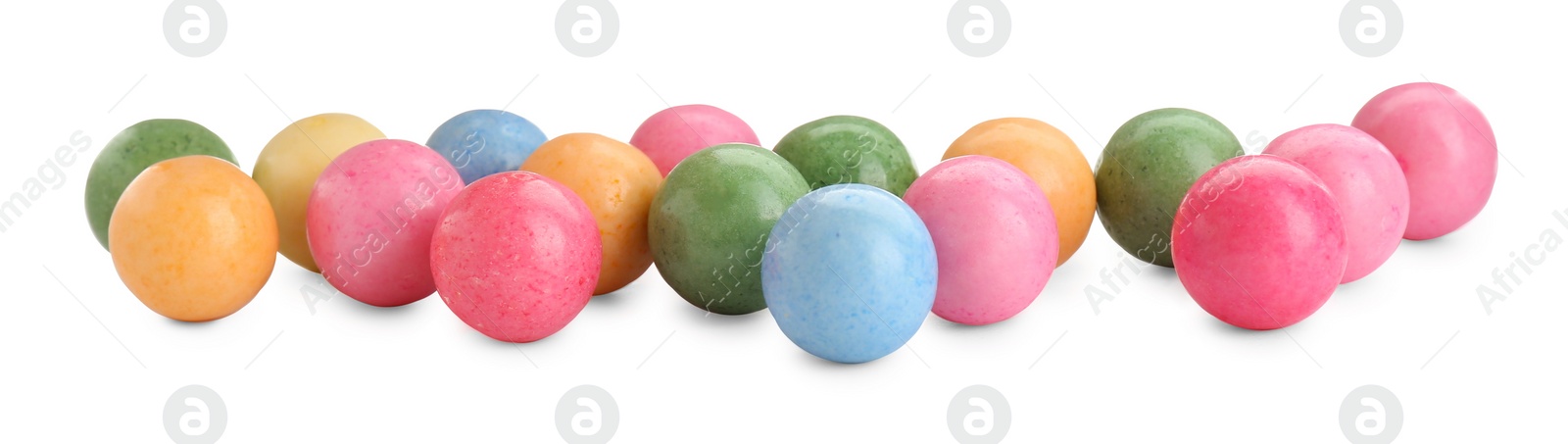 Photo of Many bright chewy gumballs isolated on white