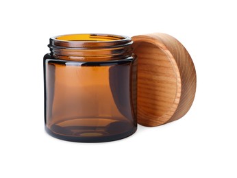 Photo of New empty glass jar with wooden lid isolated on white