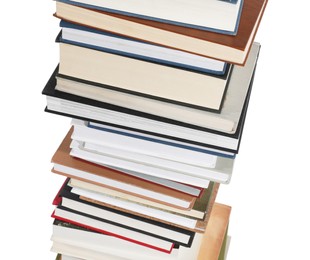 Photo of Stack of many different books isolated on white