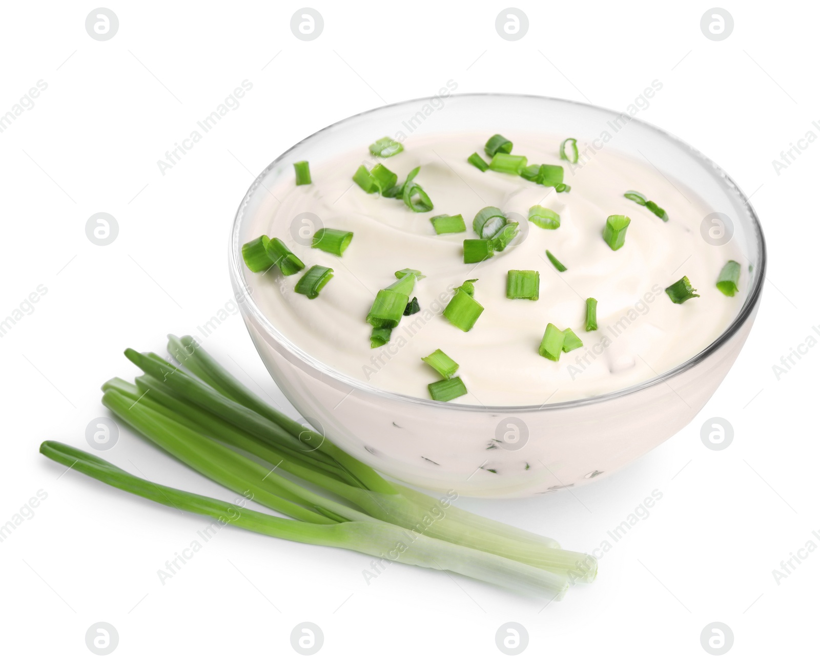 Photo of Fresh sour cream with onion on white background