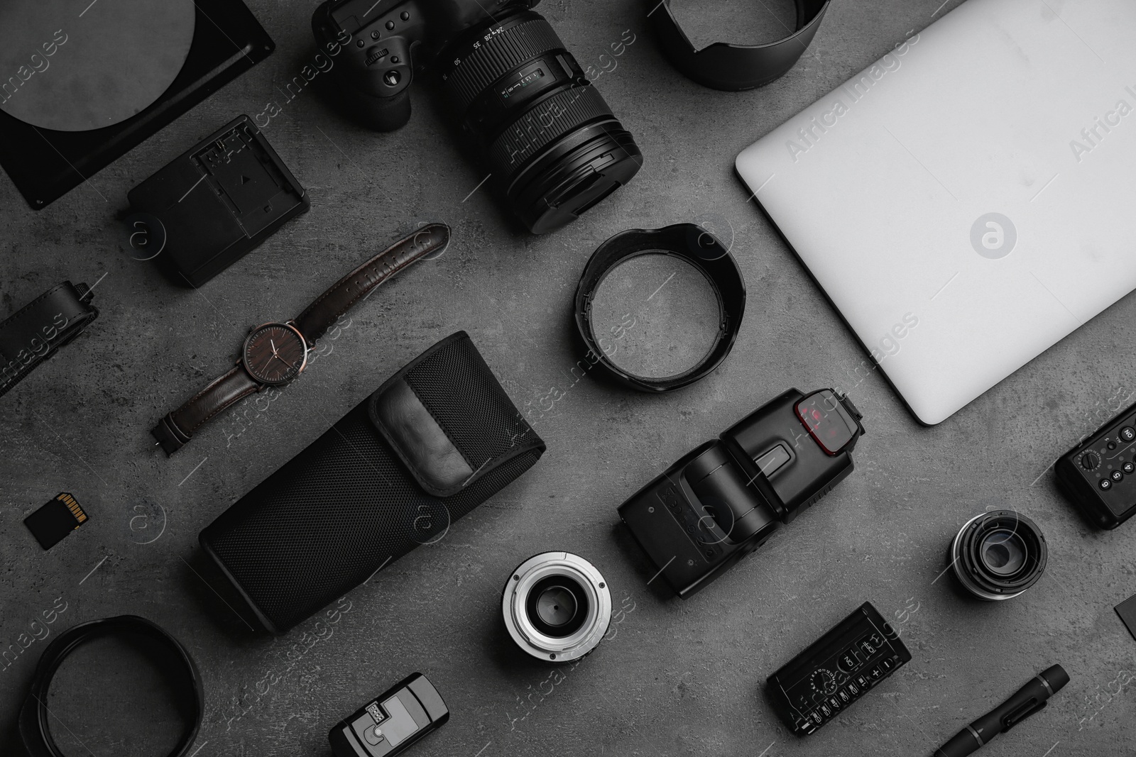 Photo of Flat lay composition with photographer's equipment and accessories on grey background