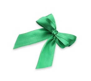 Photo of Green satin ribbon bow isolated on white, top view