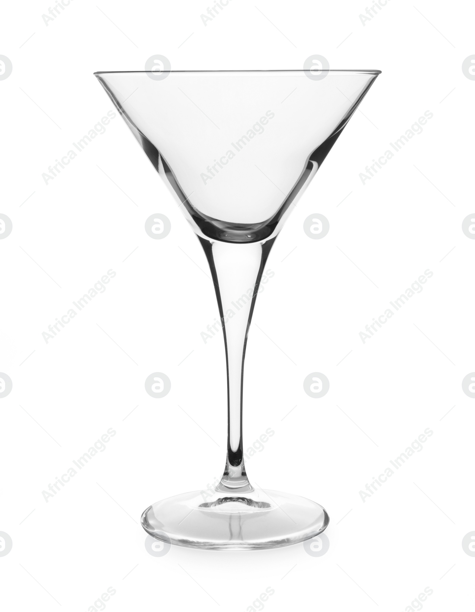 Photo of Elegant clean empty martini glass isolated on white