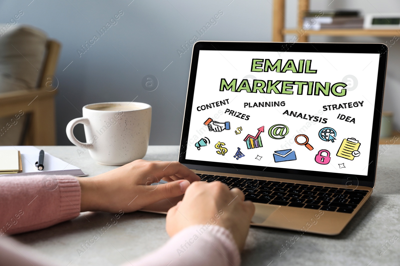 Image of Email marketing. Woman using laptop at table, closeup