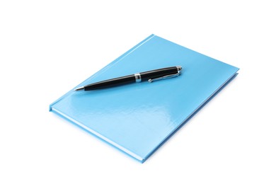 Photo of Light blue planner with pen isolated on white