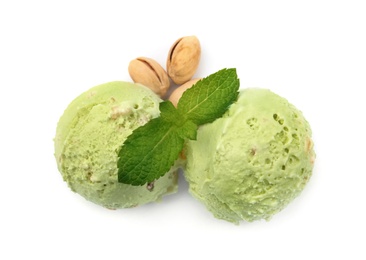 Photo of Scoops of delicious pistachio ice cream with mint and nuts on white background, top view