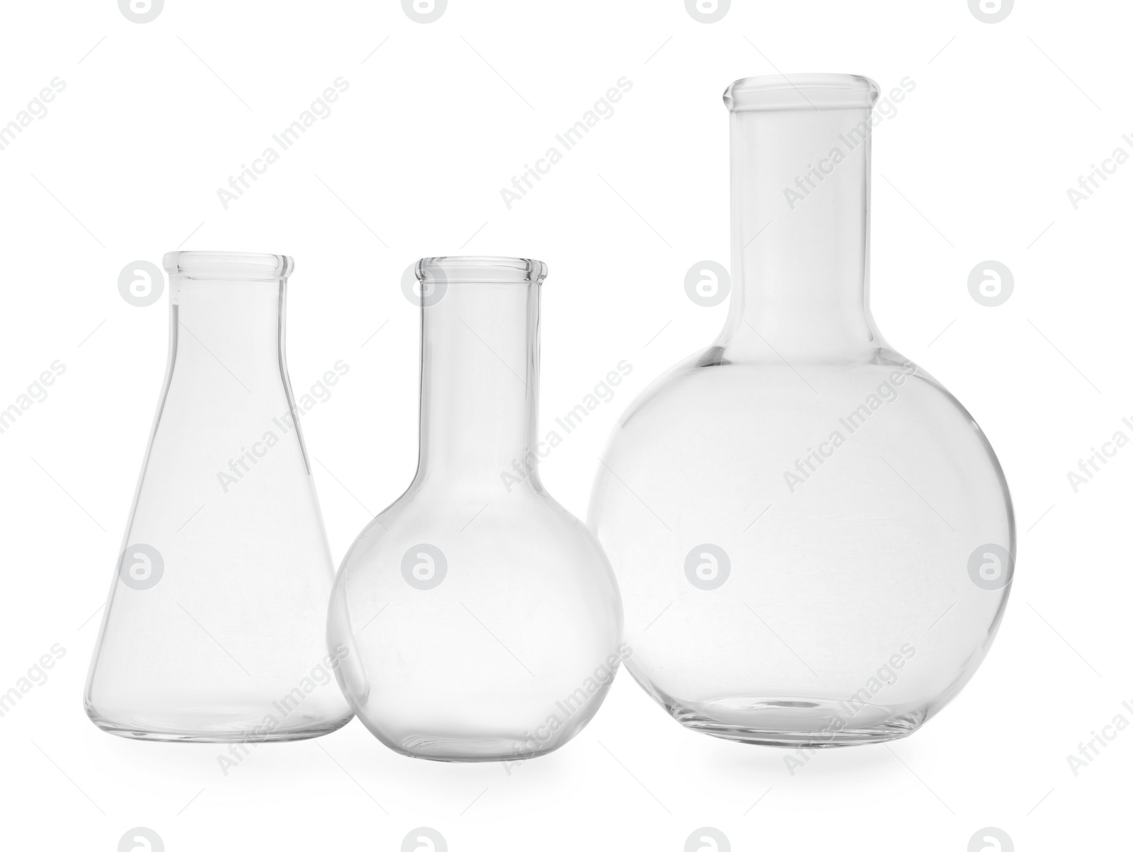 Photo of Empty flasks on white background. Laboratory equipment