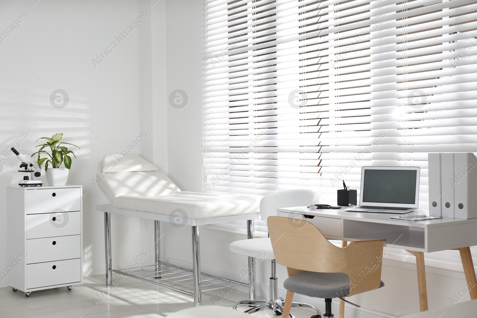 Photo of Doctor's office interior with modern workplace in clinic