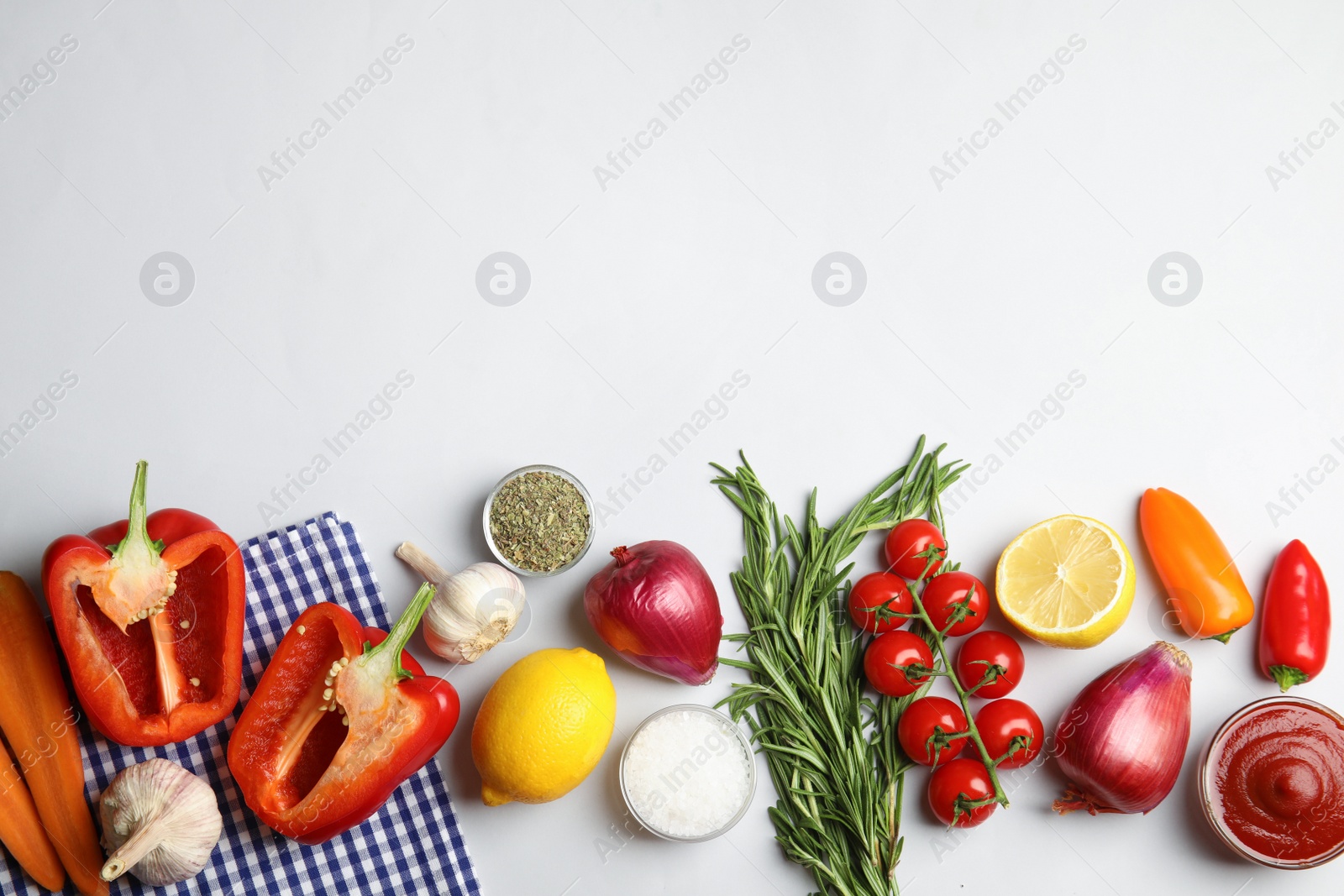 Photo of Flat lay composition with ingredients for cooking on white background. Space for text