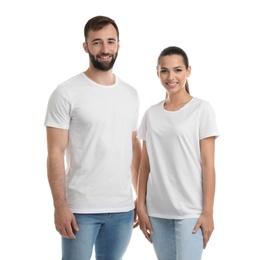 Photo of Young couple in t-shirts on white background. Mockup for design