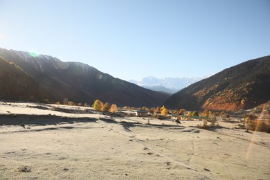 Picturesque view of beautiful high mountains under blue sky on sunny day