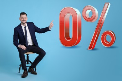 Image of Handsome man pointing at sign Zero Percent on light blue background. Special promotion