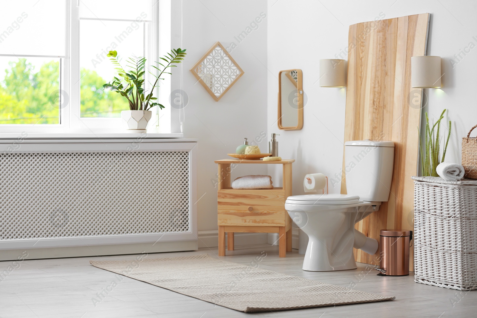 Photo of Toilet bowl in modern bathroom interior