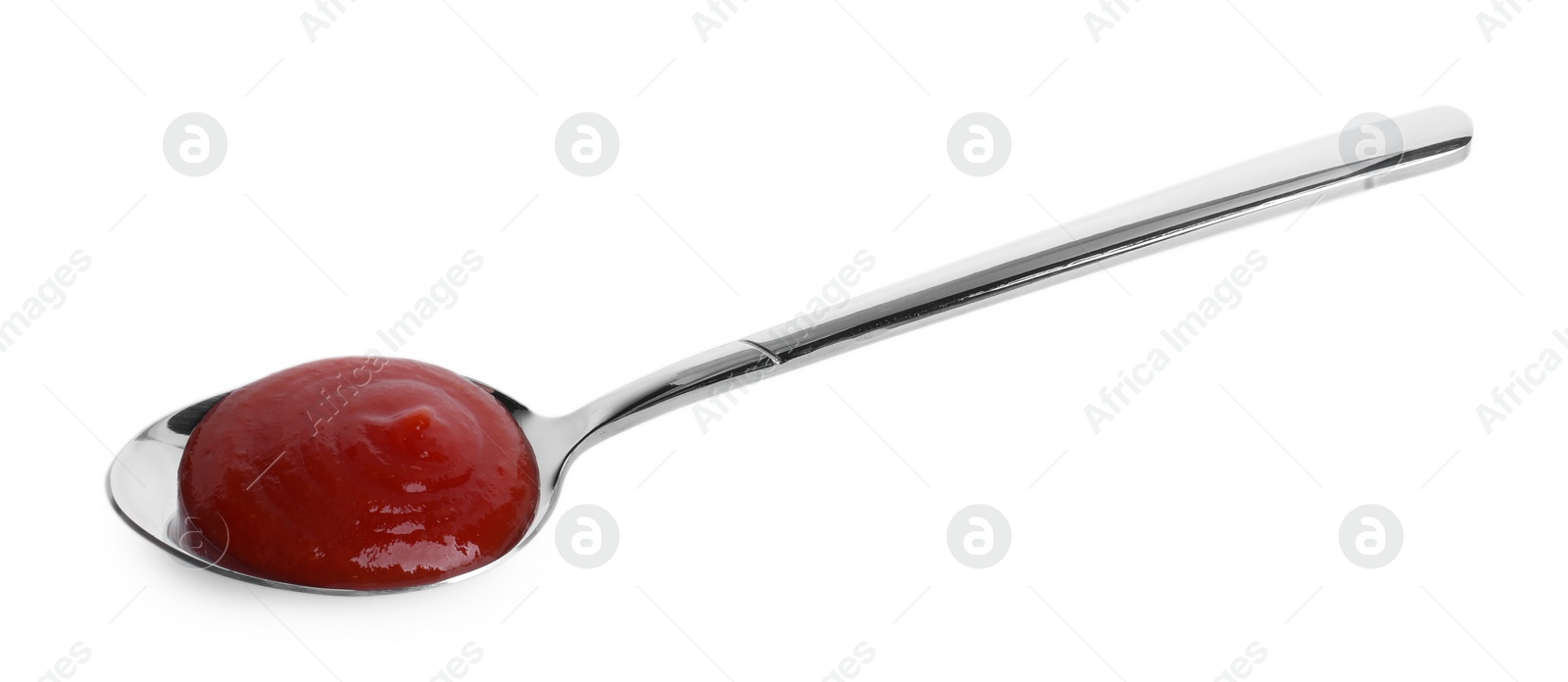 Photo of Spoon with tasty ketchup isolated on white. Tomato sauce