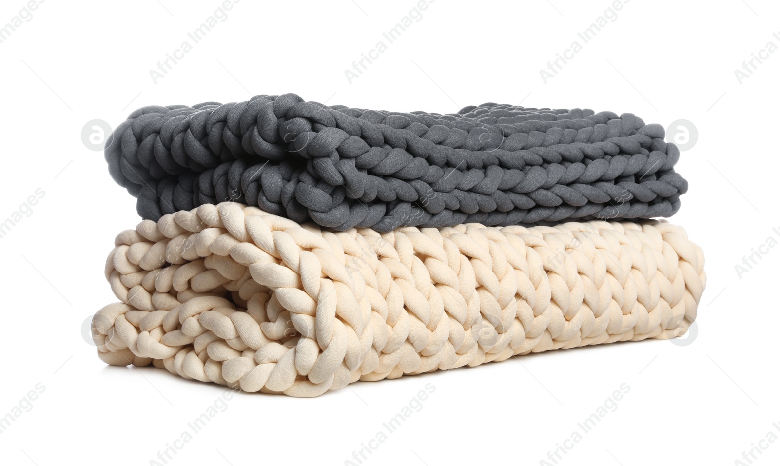 Photo of Knitted merino wool plaids on white background