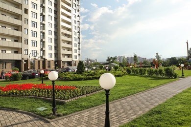 KYIV, UKRAINE - MAY 21, 2019: Beautiful view of modern housing estate in Pecherskyi district on sunny day