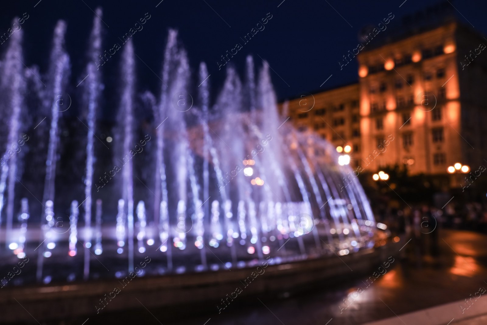 Photo of Blurred view of beautiful city at night. Bokeh effect