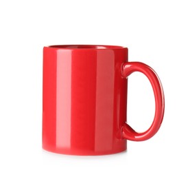 Photo of Empty red ceramic mug isolated on white