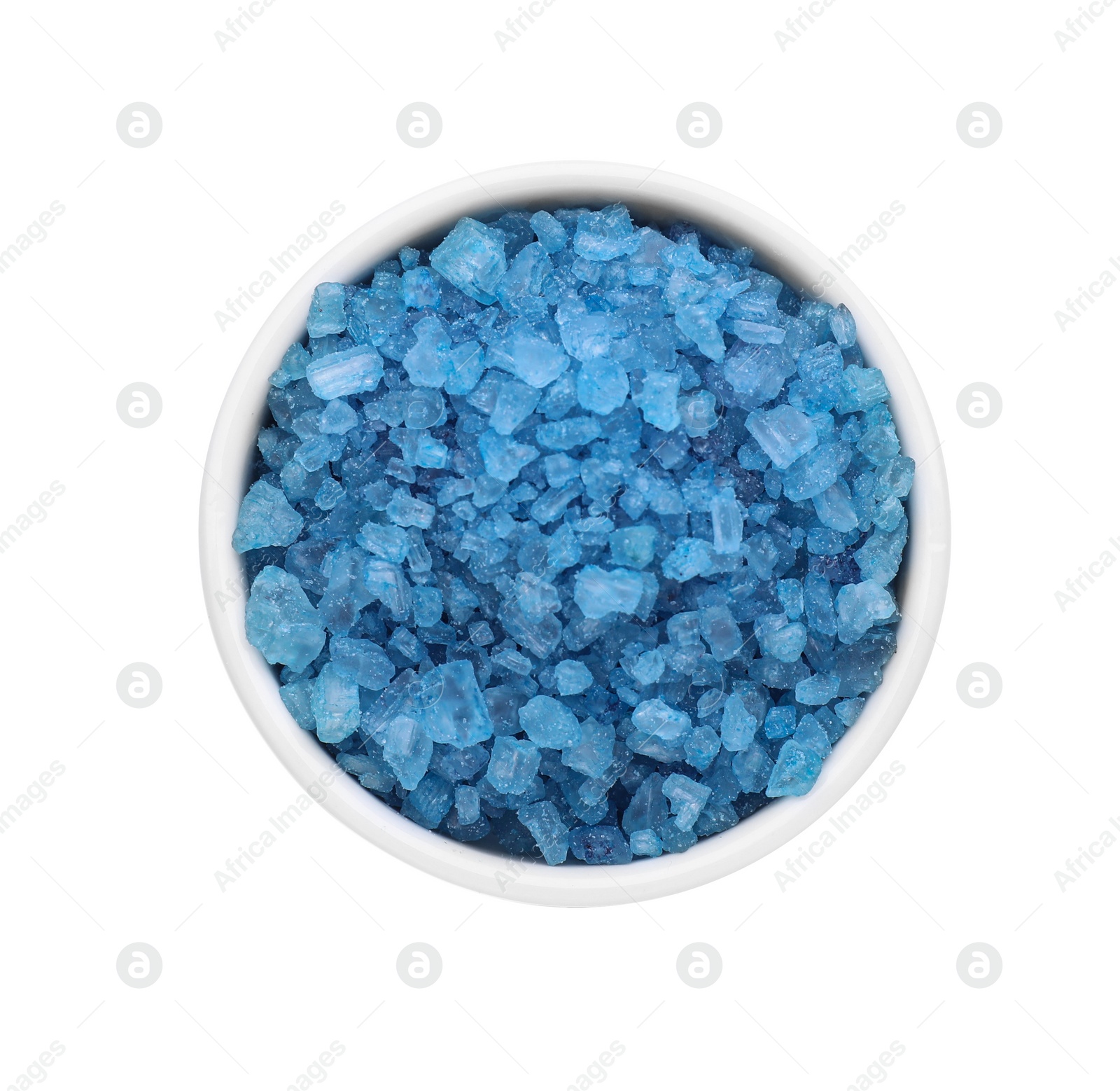 Photo of Bowl with blue sea salt isolated on white, top view