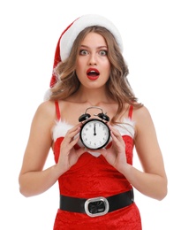 Photo of Beautiful Santa girl with alarm clock on white background. Christmas celebration