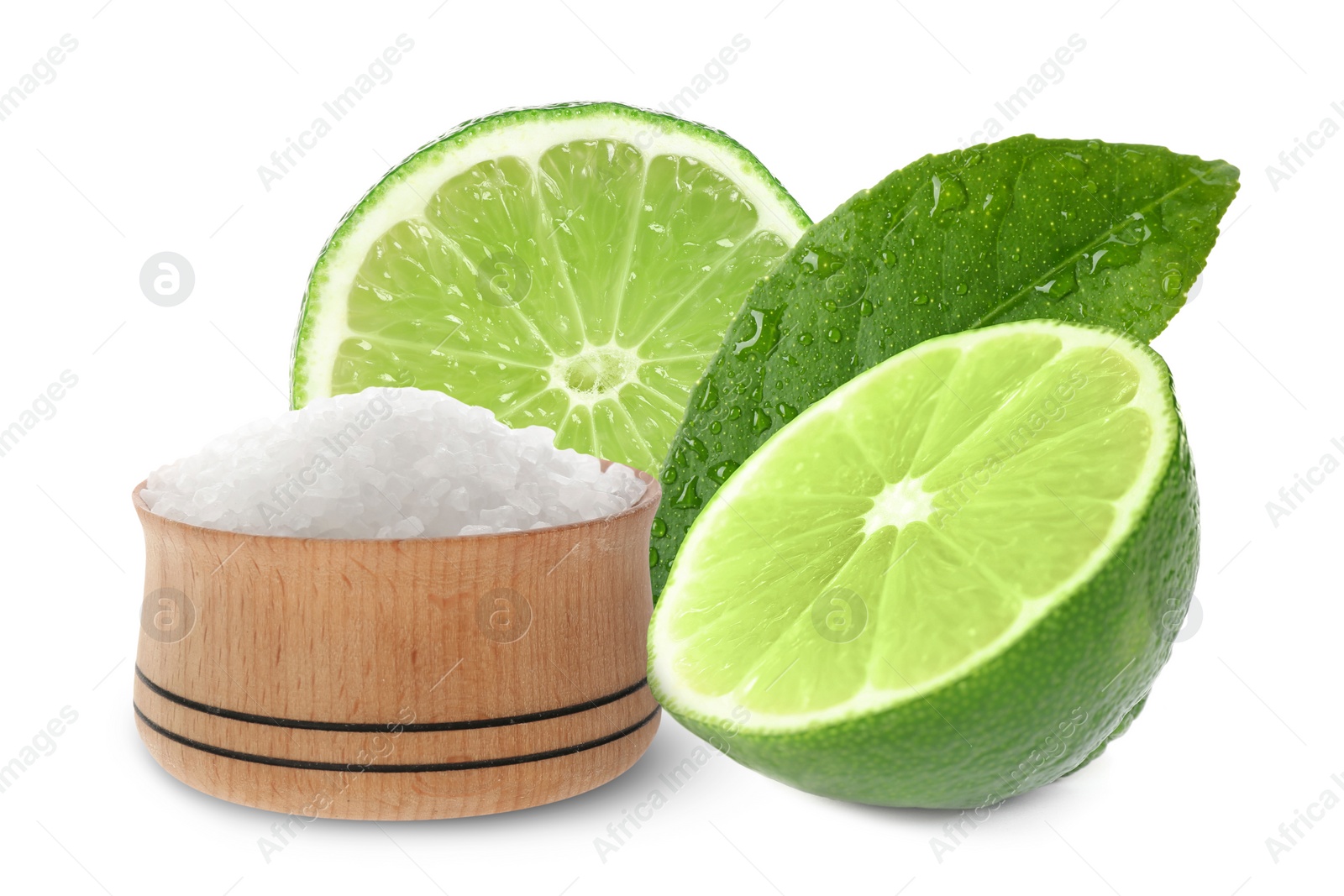 Image of Cut lime and salt isolated on white. Margarita cocktail ingredients