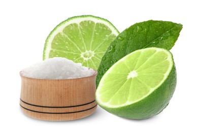 Image of Cut lime and salt isolated on white. Margarita cocktail ingredients