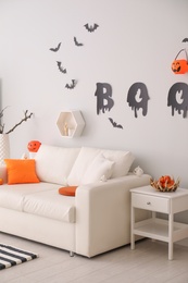 Photo of Stylish room interior with creative Halloween decor