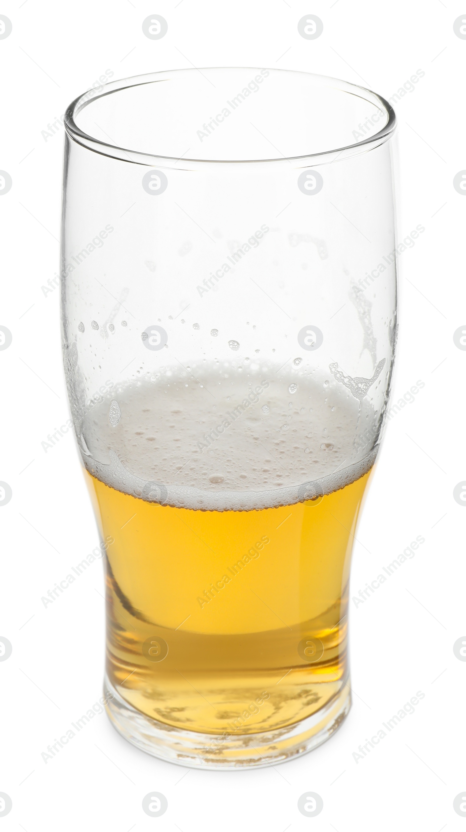 Photo of Half full glass of beer isolated on white