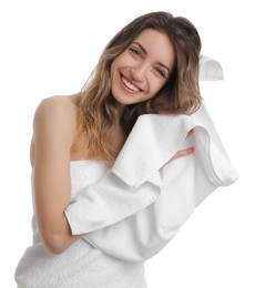 Photo of Beautiful young woman wiping hair with towel after washing on white background