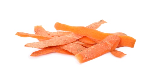 Photo of Carrot peel on white background. Composting of organic waste