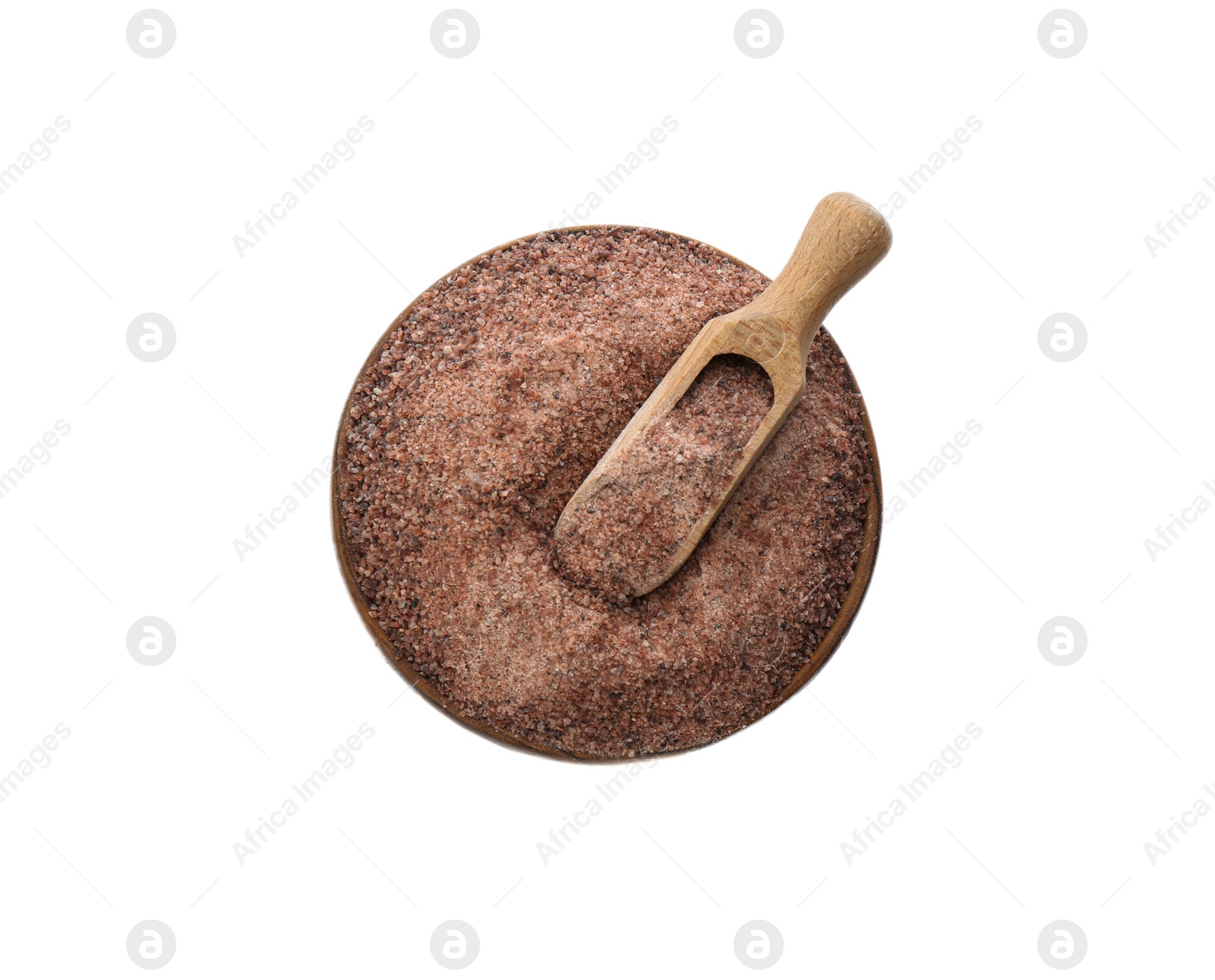 Photo of Ground black salt in bowl with scoop isolated on white, top view