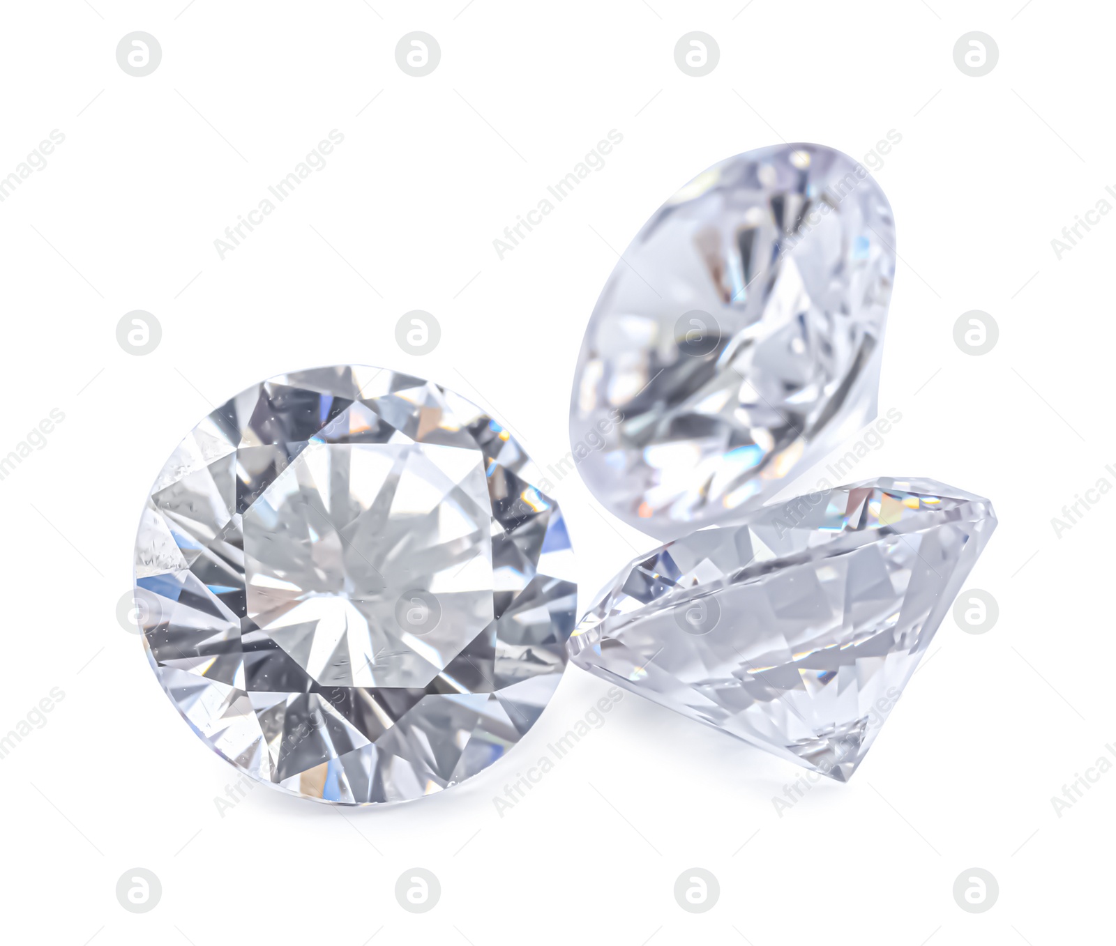 Photo of Different beautiful shiny diamonds isolated on white