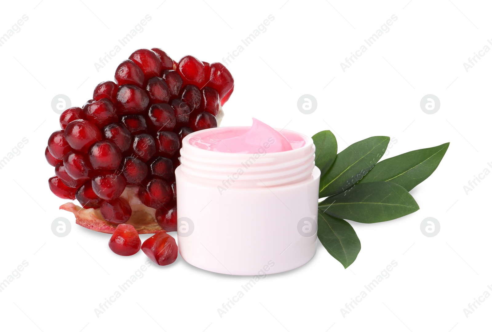 Photo of Fresh pomegranate and jar of facial mask on white background. Natural organic cosmetics