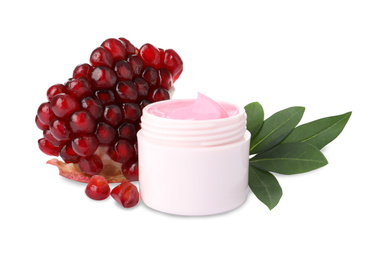 Photo of Fresh pomegranate and jar of facial mask on white background. Natural organic cosmetics