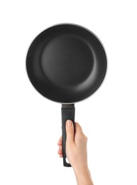 Woman holding new non-stick frying pan on white background, closeup