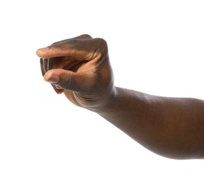 African-American man holding something in hand on white background, closeup