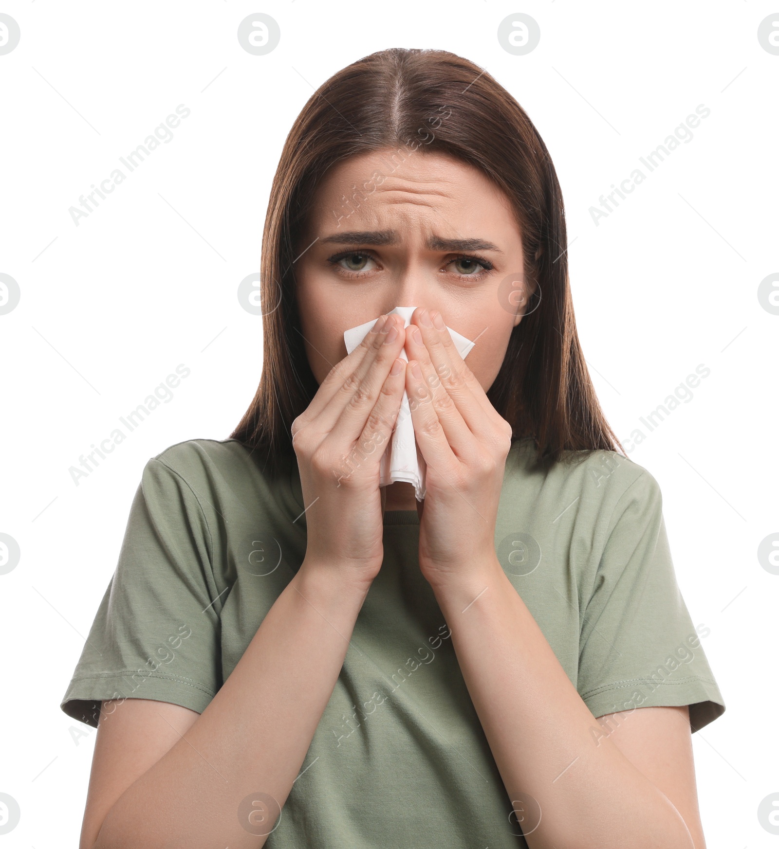 Photo of Woman blowing nose on white background. Cold symptoms