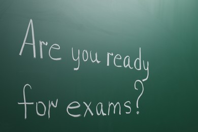 Green chalkboard with phrase Are You Ready For Exams as background