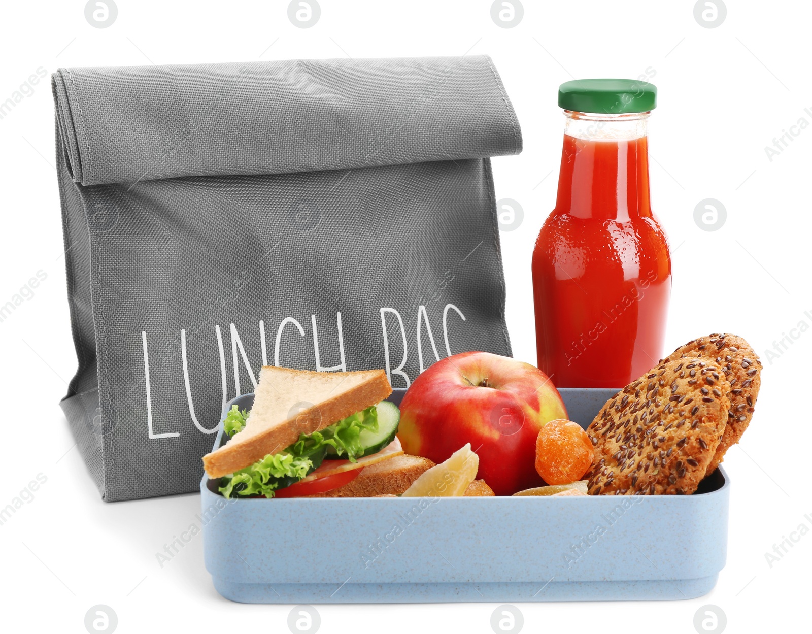 Photo of Lunch box with appetizing food, bottle of juice and bag on white background